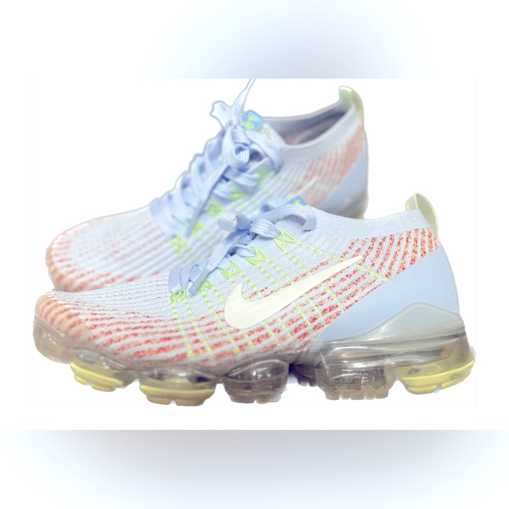 Baby blue, lime green, and orange tennis shoes
